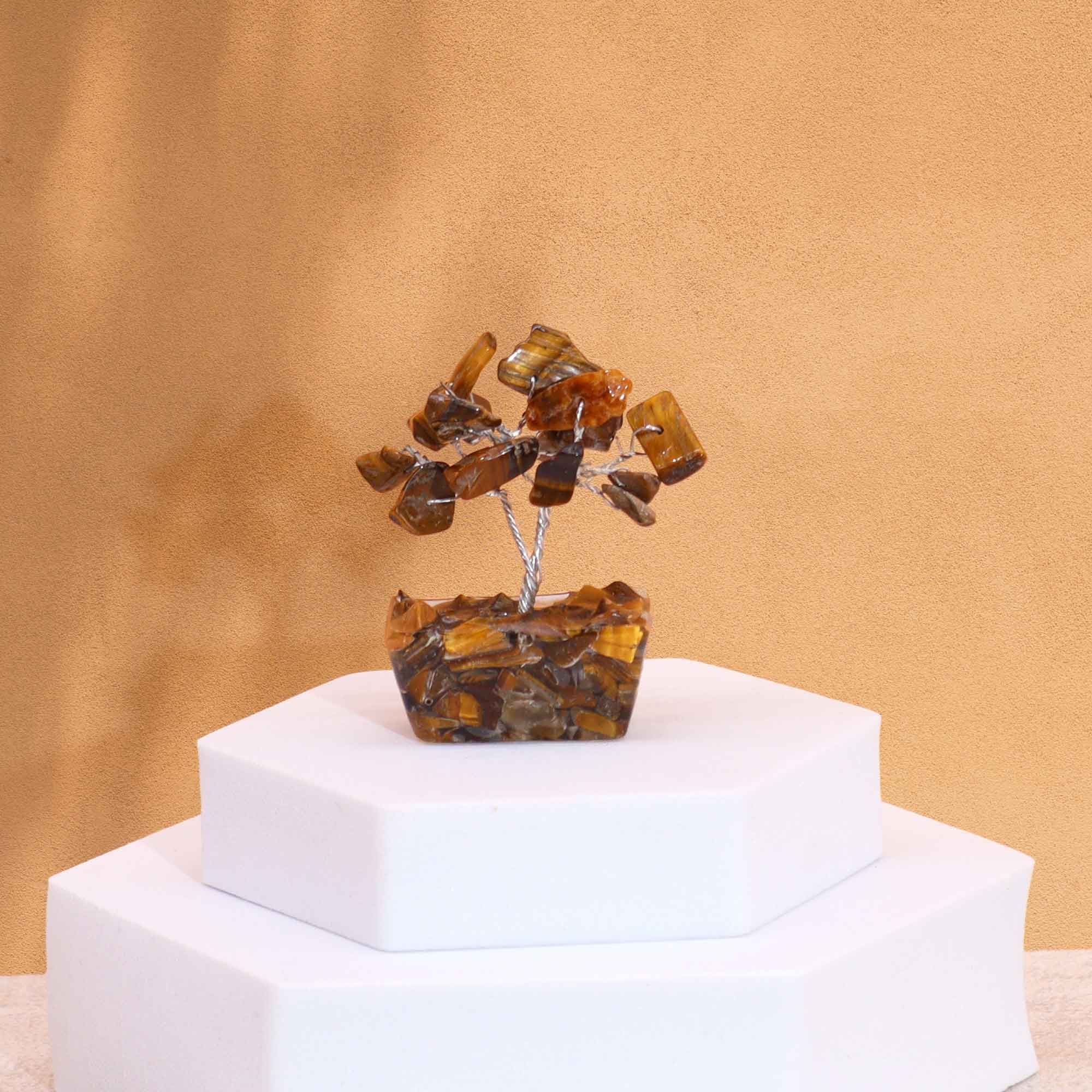 bG9jYWw6Ly9tZWRpYS9IUC9FQy82MFIzMEMxRzZXUjNFQ0hQLzRhNjljMGM4LmpwZWc.jpg Mini Gemstone Tree On Orgonite Base - Tigereye (15 stones)